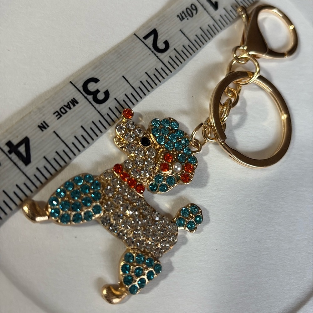Sparkling poodle dog Keychain with blue orange Accents - Picture 4 of 5